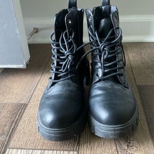 Black lace up combat boots